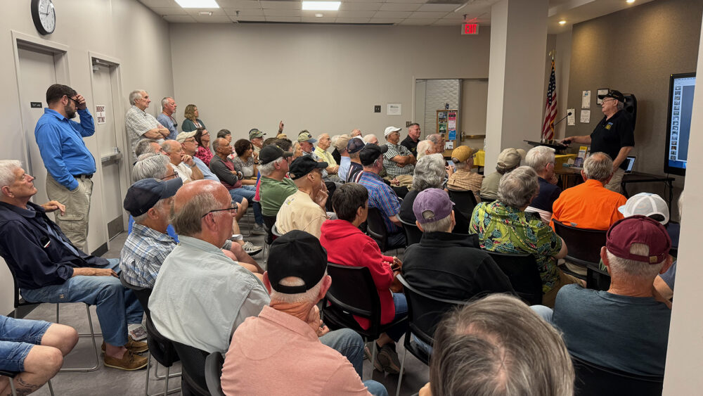 C.W. Bowman speaking image