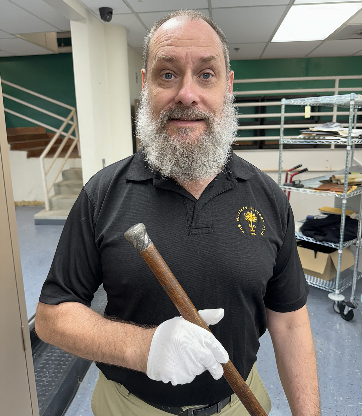Joe Long holds a cane that one ghost apparently longed for image